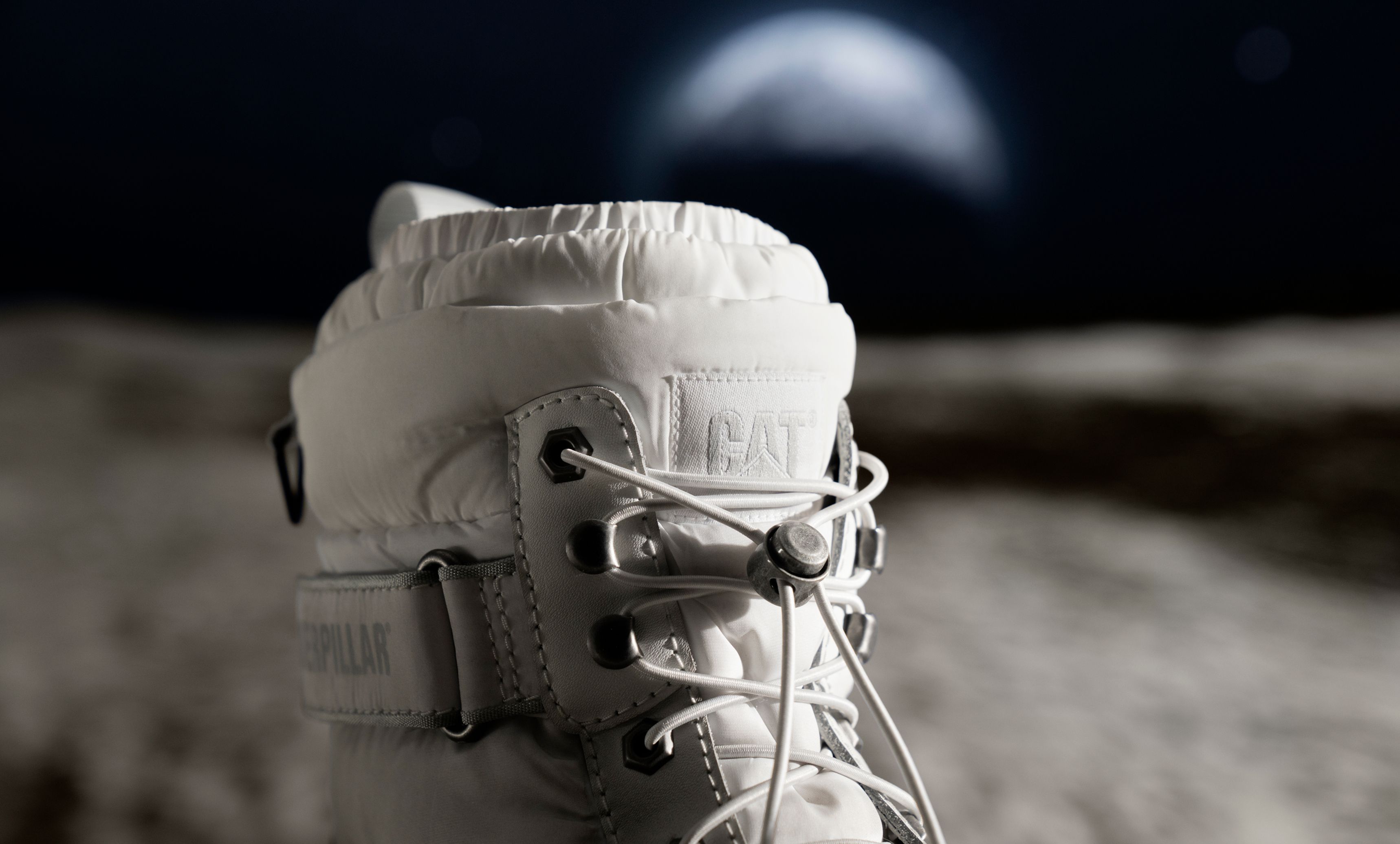 Close-up of the CAT logo on an Apollo 11 boot.