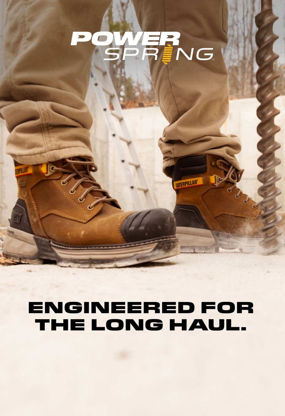 Brown boots being worn in the snow.