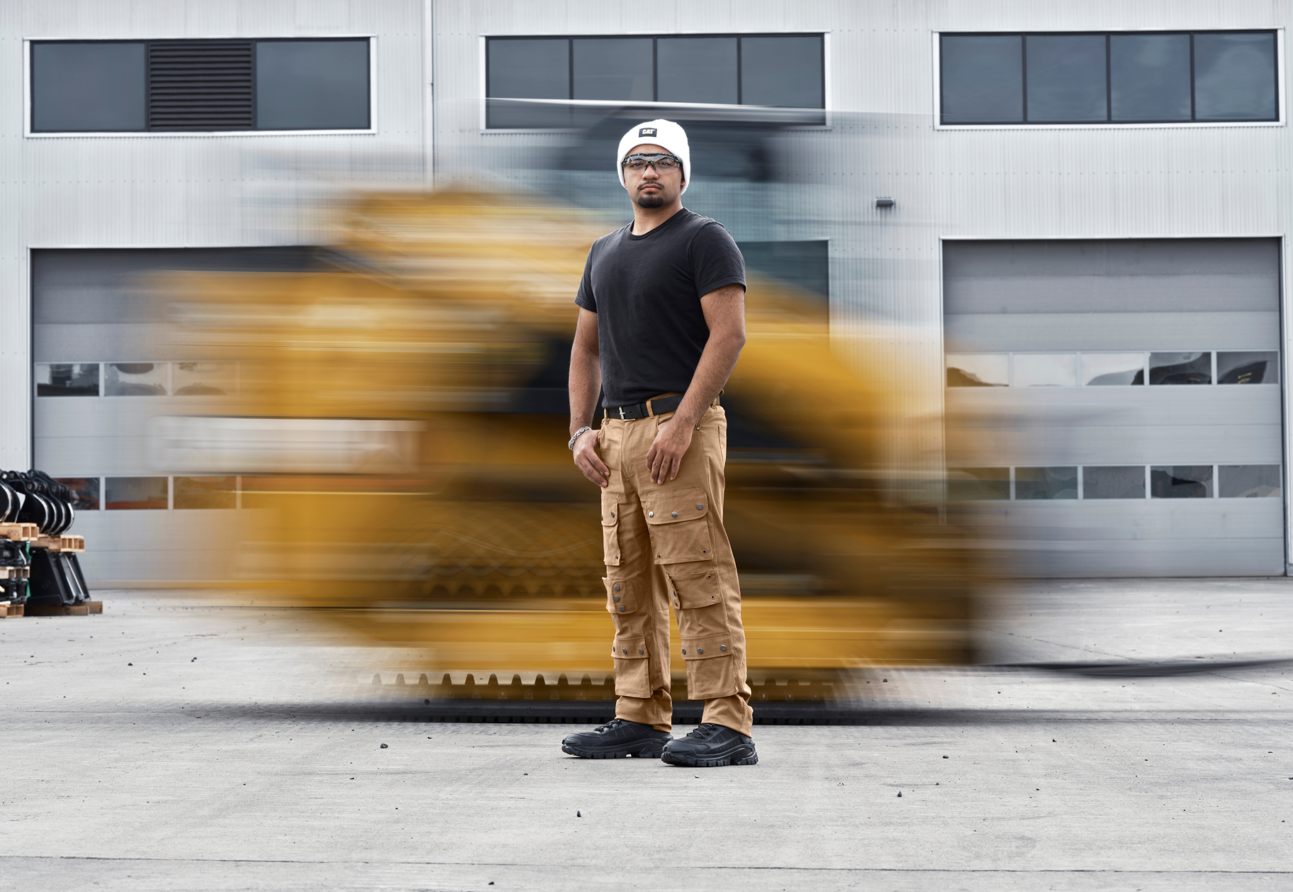 Standing in front of fast-moving CAT equipment