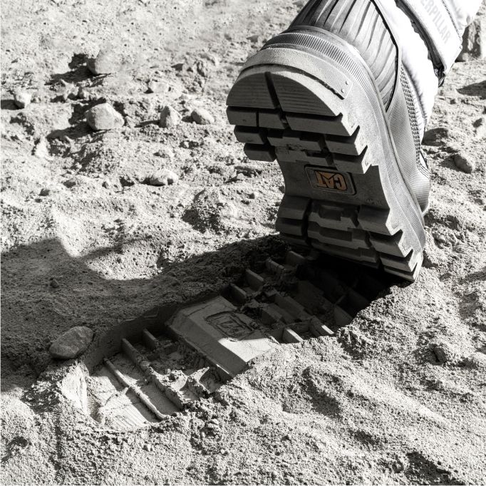 Footprint showing CAT logo on the lunar surface.