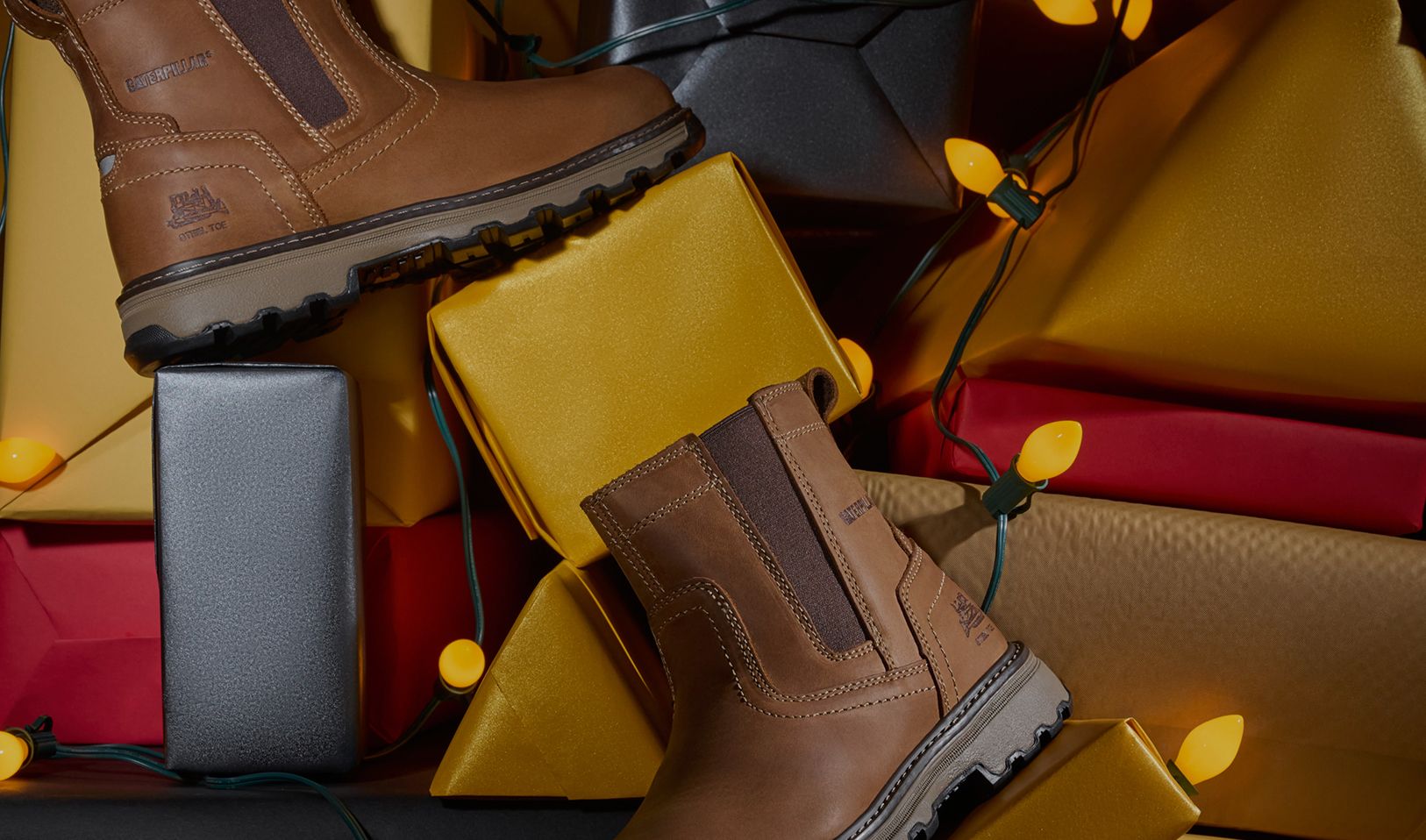 Boots on snowy caterpillar tracks.