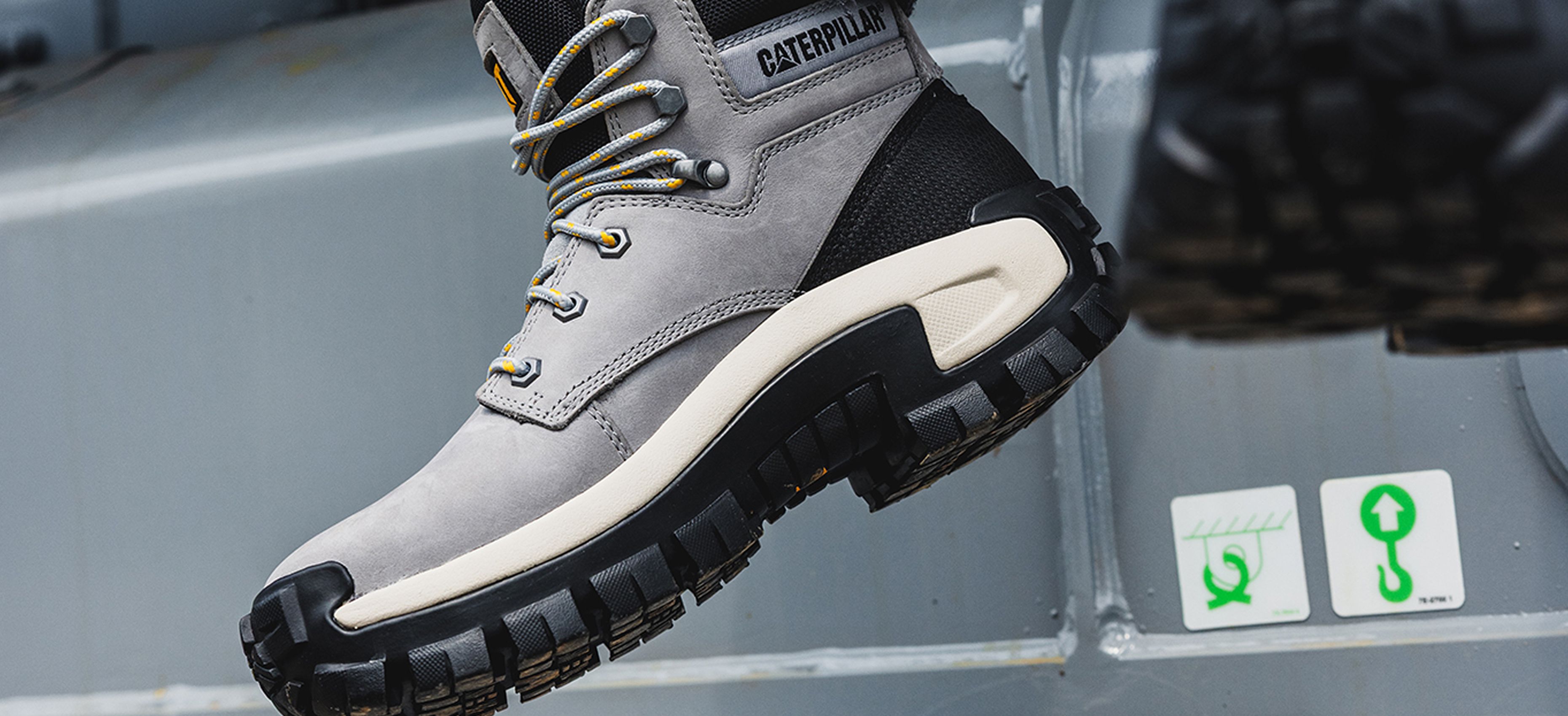 Grey boot on Cat equipment.