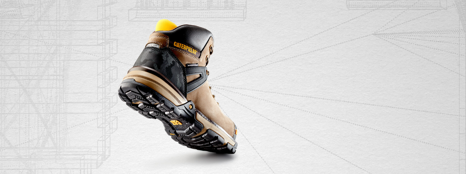 Tan, black and yellow Excavator boot.