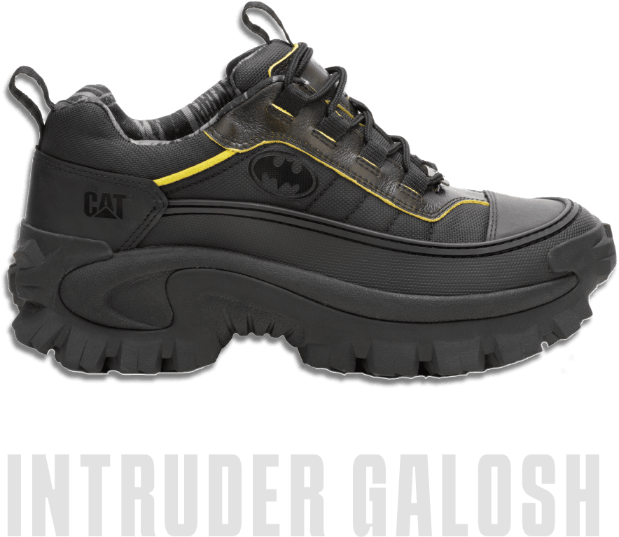 Close-up of black & yellow shoes with Batman logo.