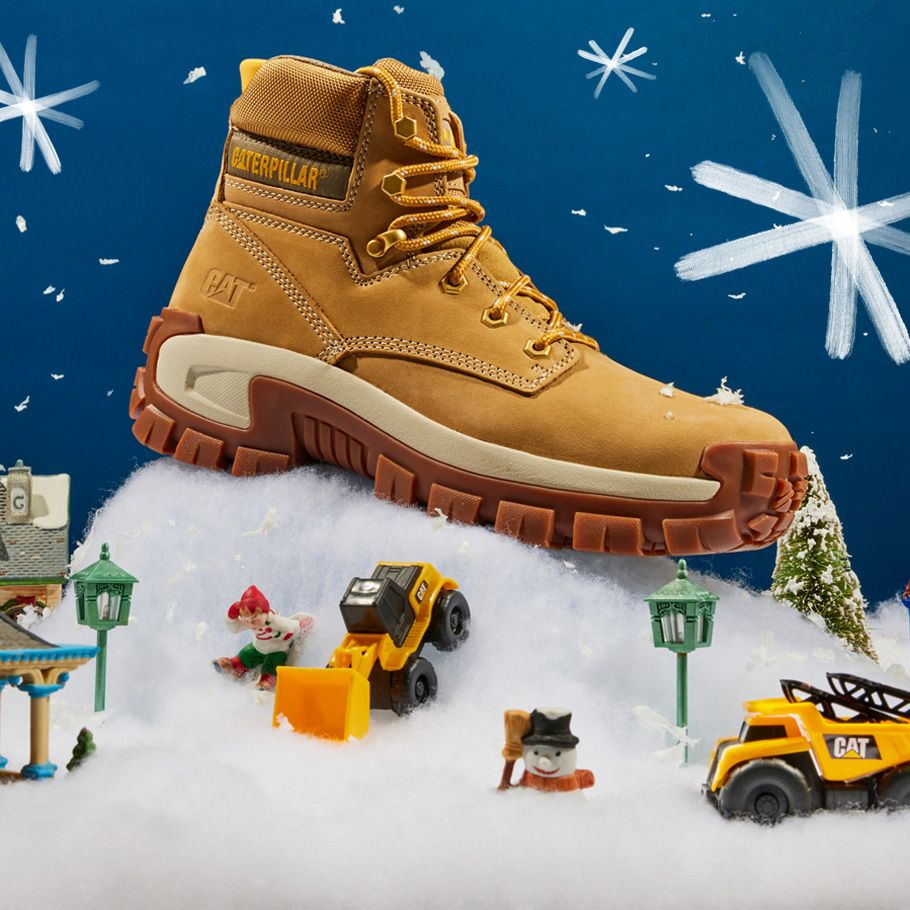 Cat boot in miniature snow scene.