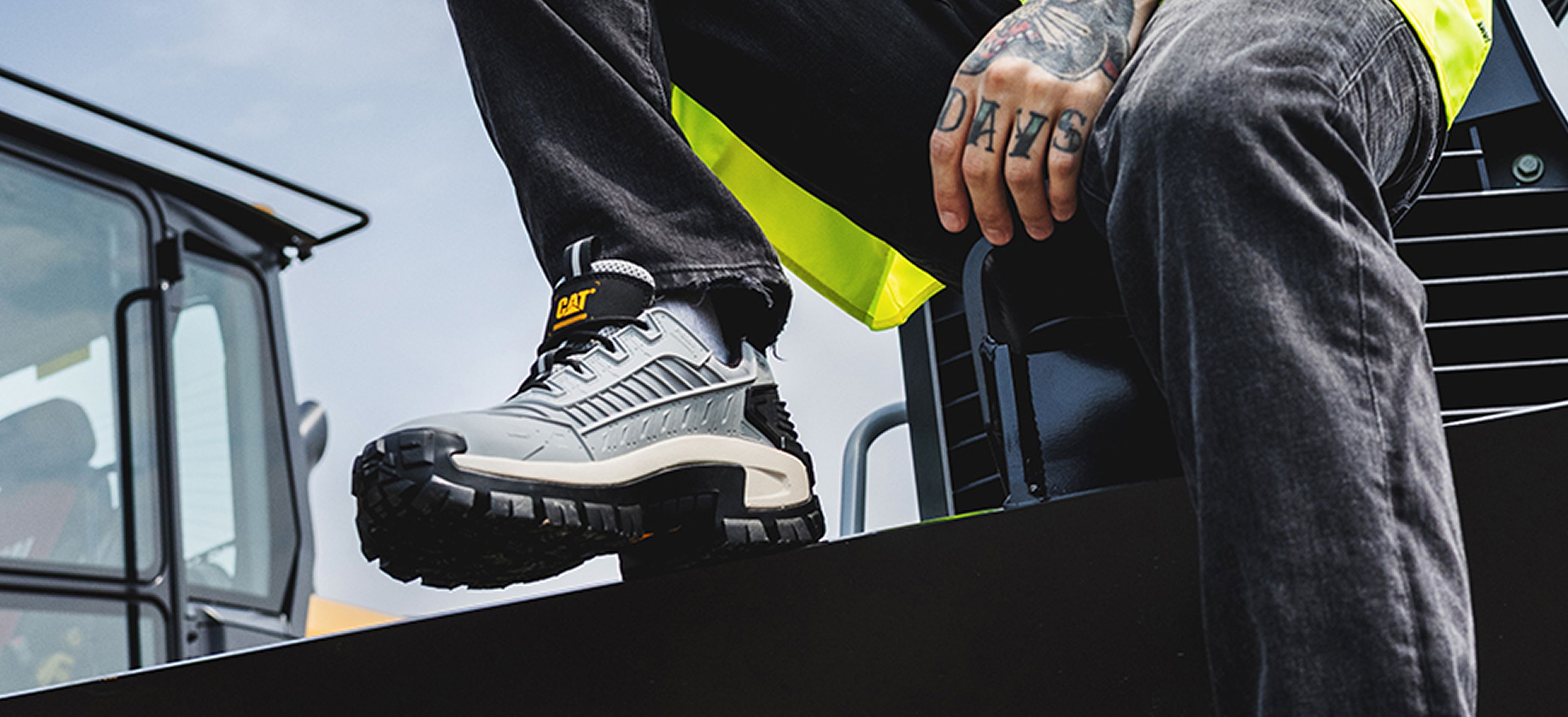 Grey shoe on Cat equipment.