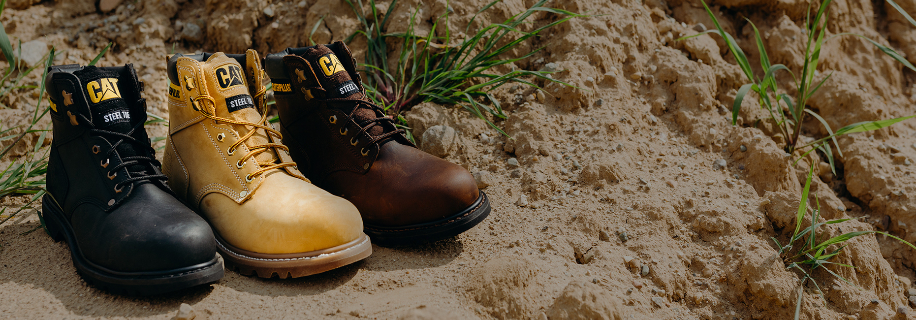 CAT Second Shift Boots sitting in the sand