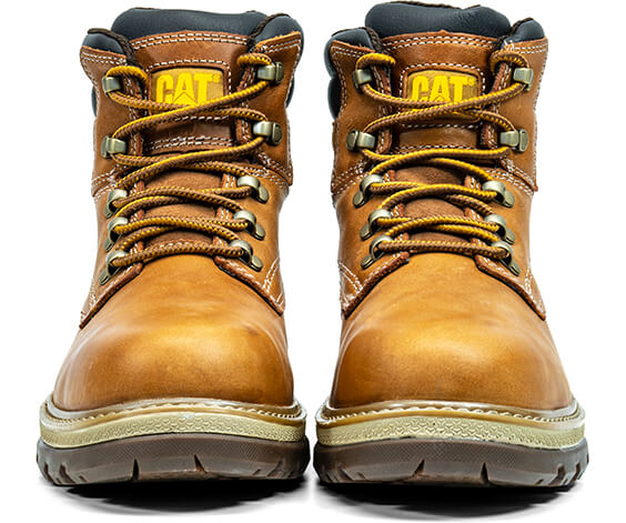 A pair of yellow CAT boots.