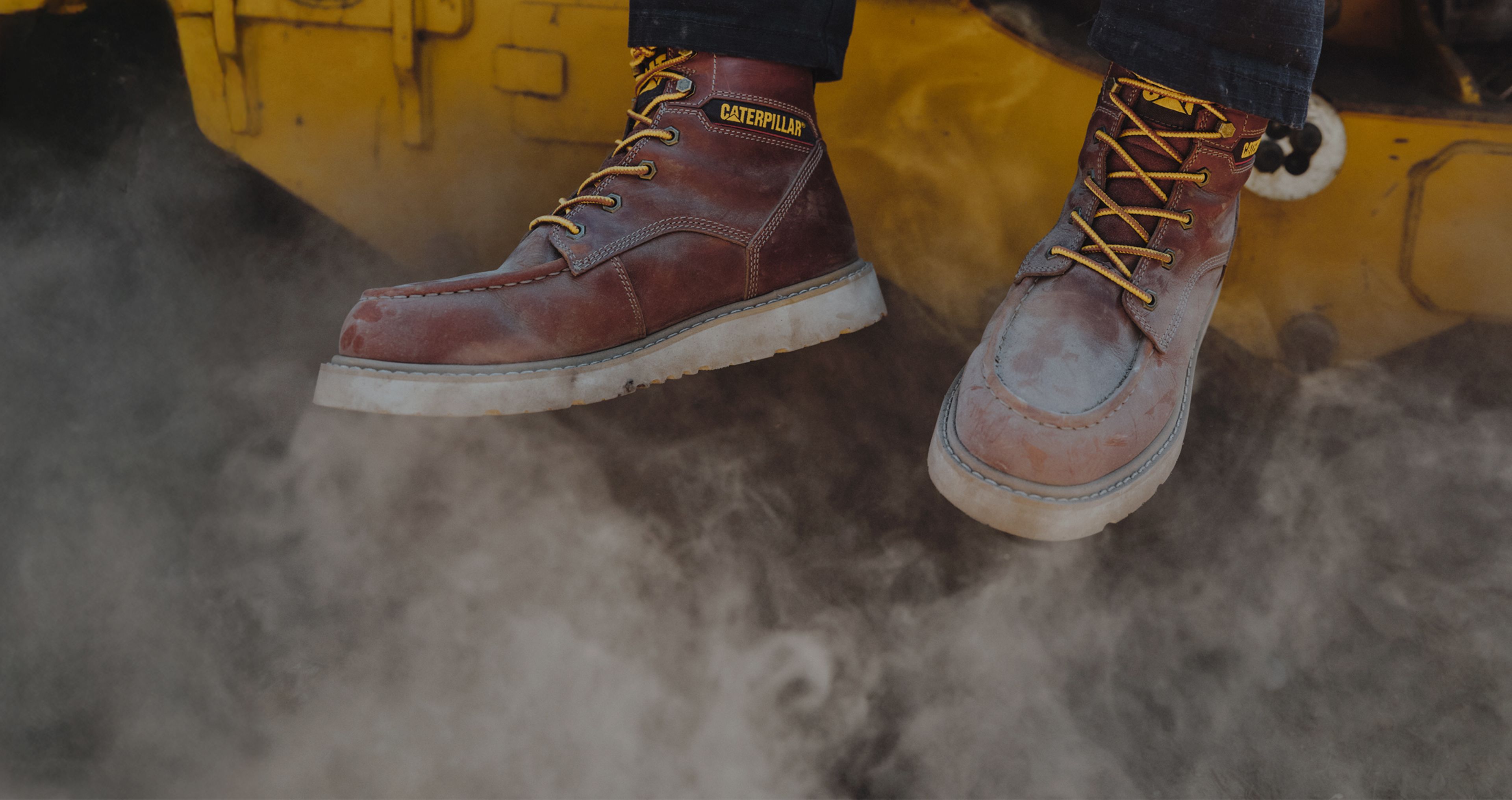 Climbing into the cab of a machine.